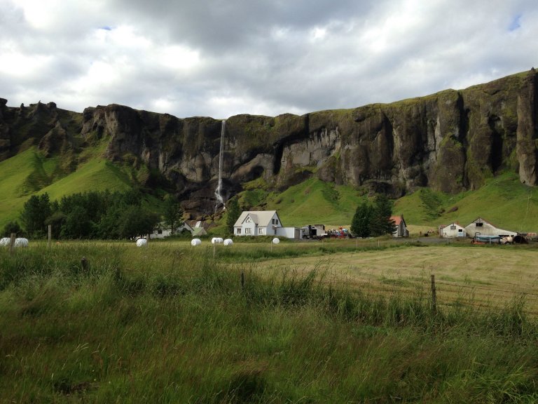 Farm with waterfall in south Iceland